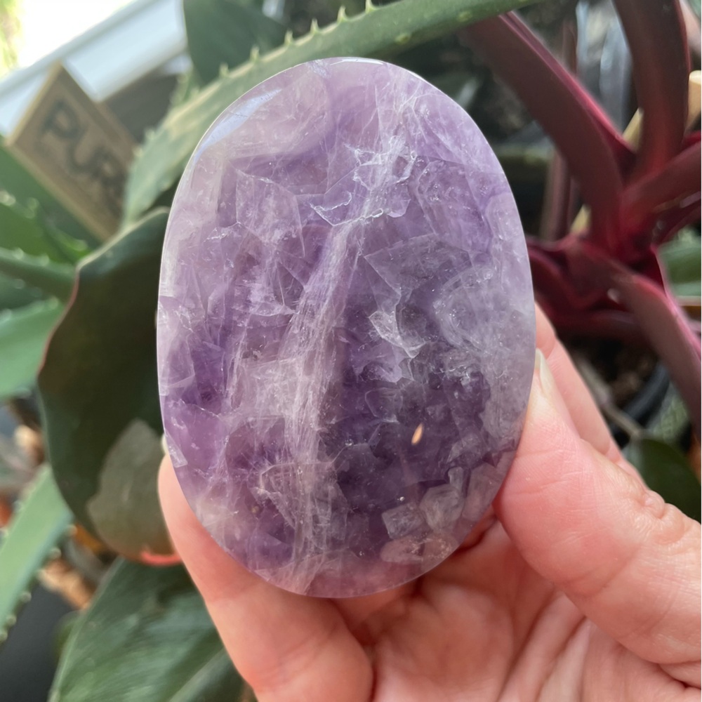 Large amethyst, fully polished crystal palm stone